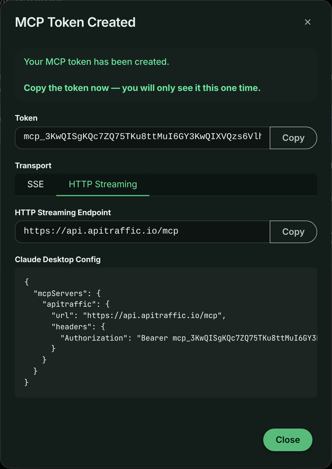 MCP Token Created dialog with the token and Copy button, transport tabs, endpoint URL and a client configuration snippet
